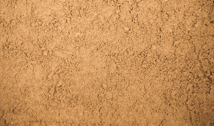 Loose display of building mortar sand, graded from 0mm to 2mm.