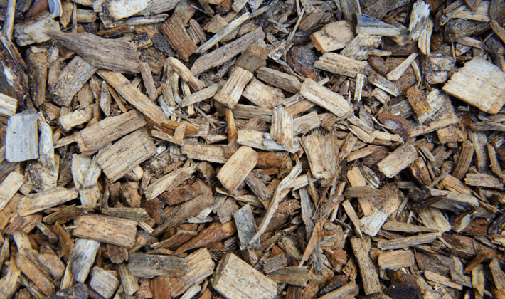 Loose display of reddish-brown play bark chippings.