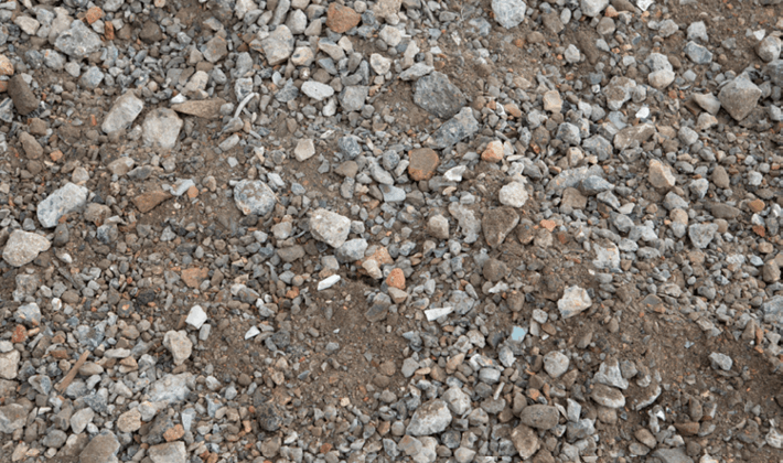 Loose display of class 6N recycled aggregate, containing well-graded particles.